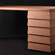 Illustration for article titled A Better Desk Design Lets You Access Multiple Drawers At Once